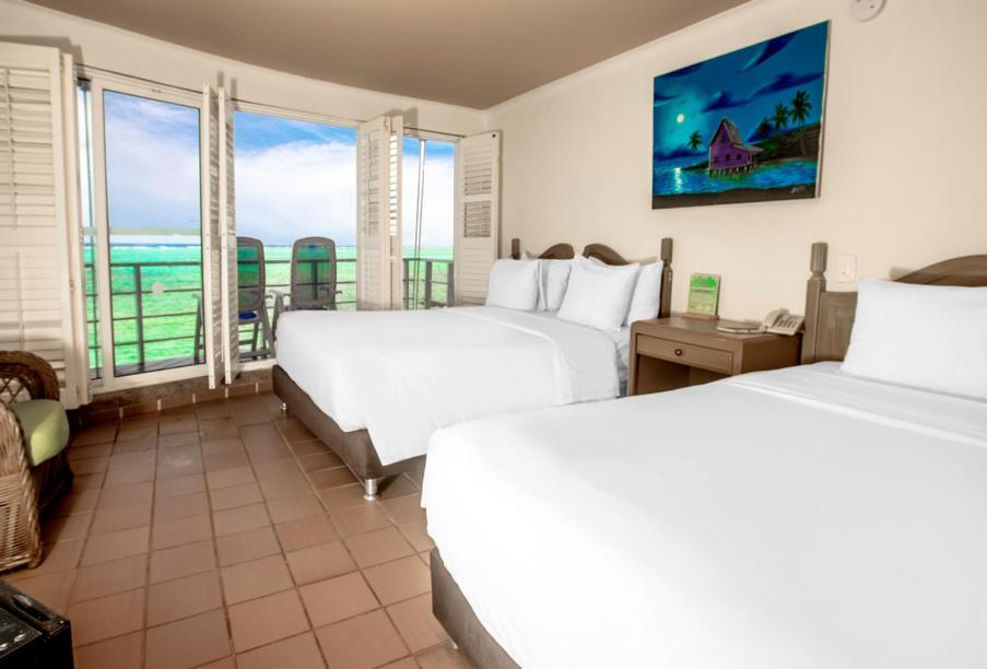 Quarto com Cama de Casal ou 2 Camas de Solteiro e Vista do Mar