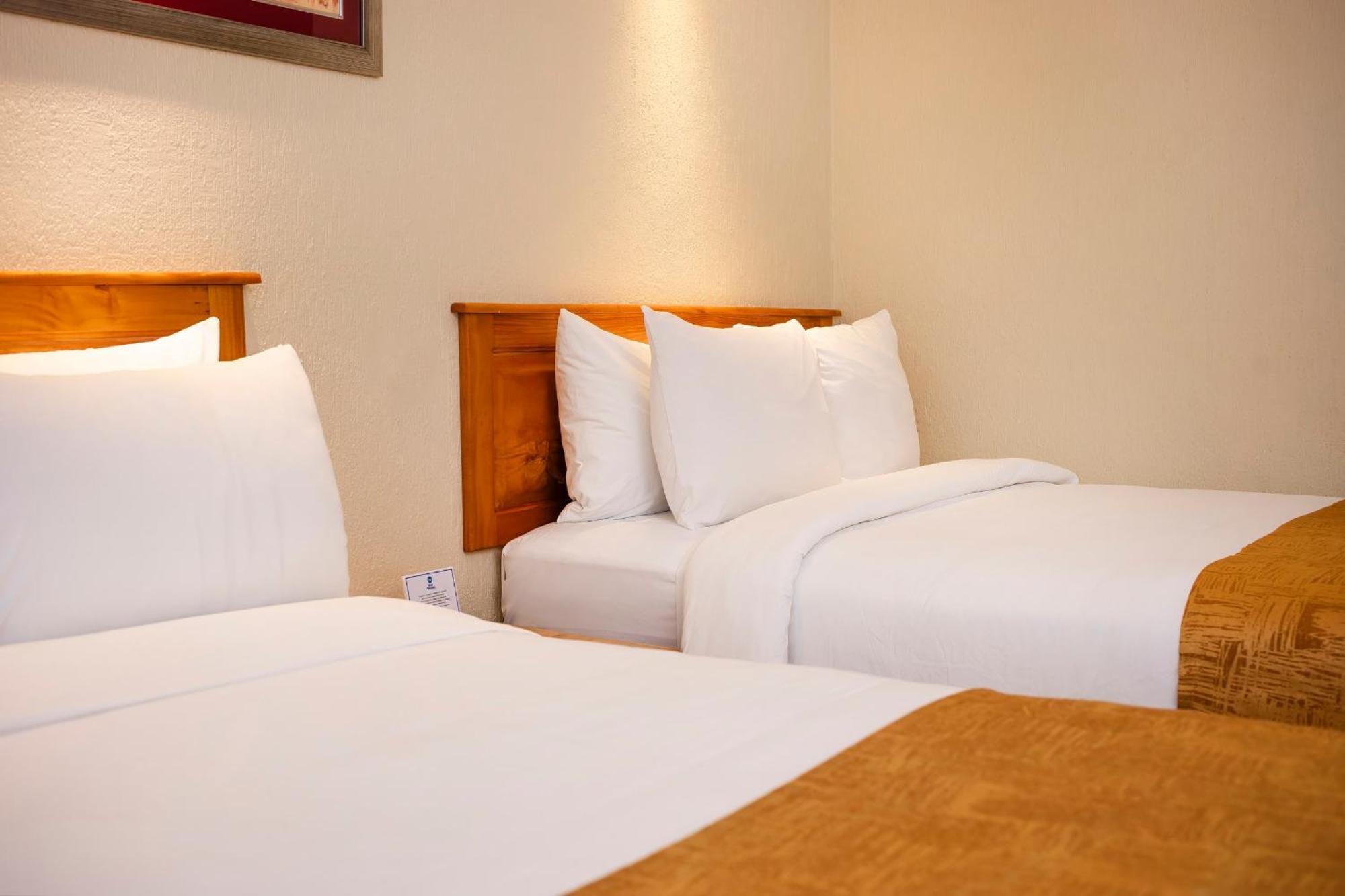 Double Room with Two Double Beds, Balcony and Pool View - Non-Smoking
