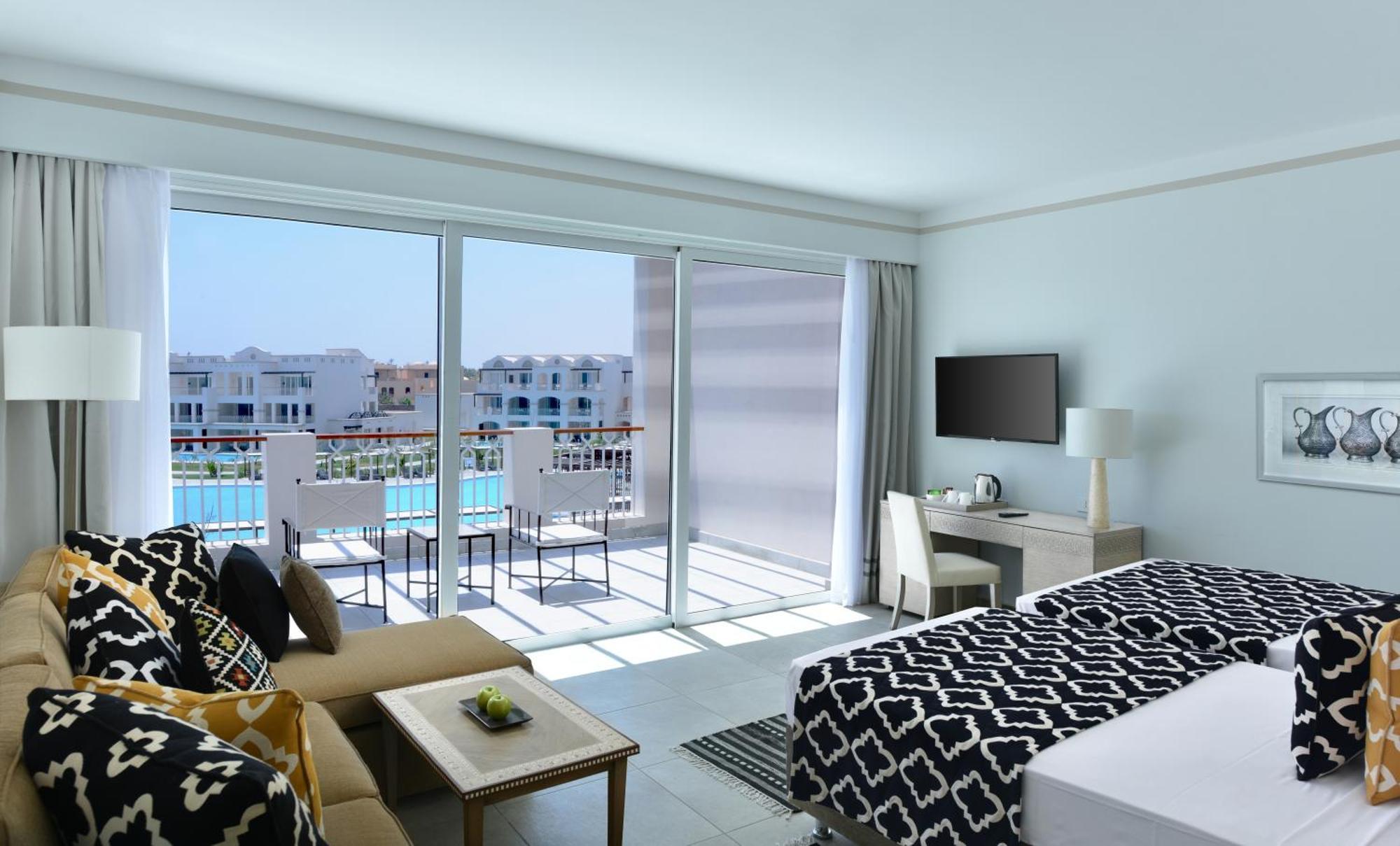 Deluxe Unterkunft mit Queensize-Bett oder 2 Einzelbetten und direktem Poolzugang