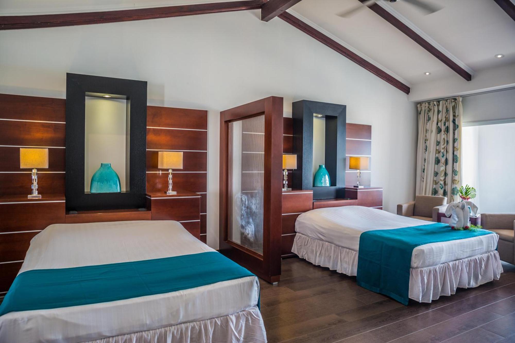 Grand suite met kingsize bed en uitzicht op de lagune (2 volwassenen)